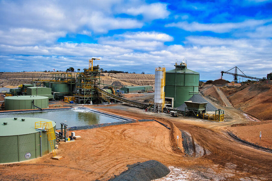 A gold mine in Western Australia, with CIL tanks, tailings thickener pad, industrial buildings and heavy machinery.